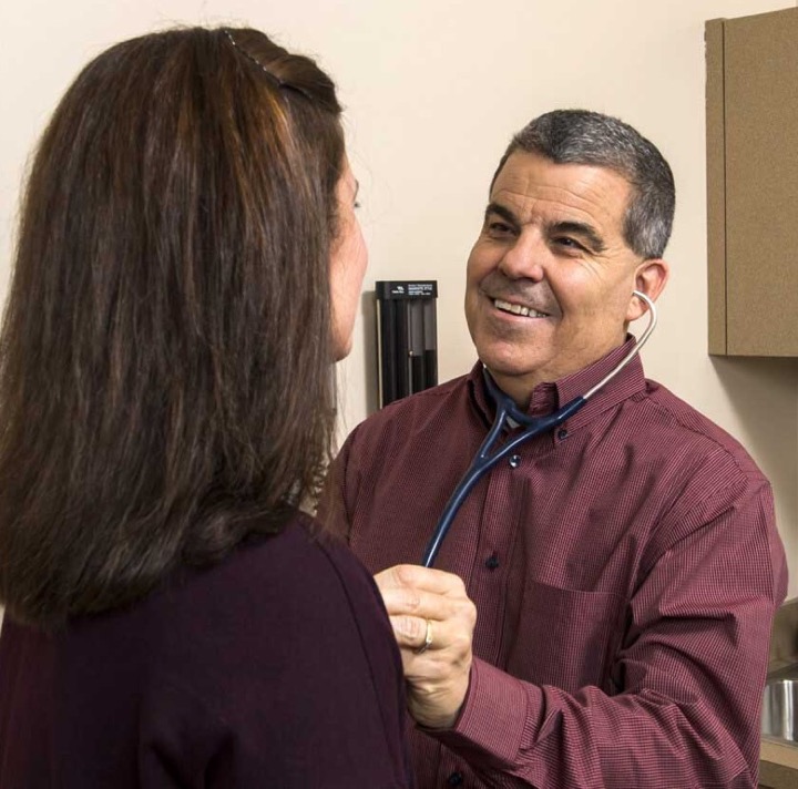 Dr. Chris Diatte providing quality care to patients