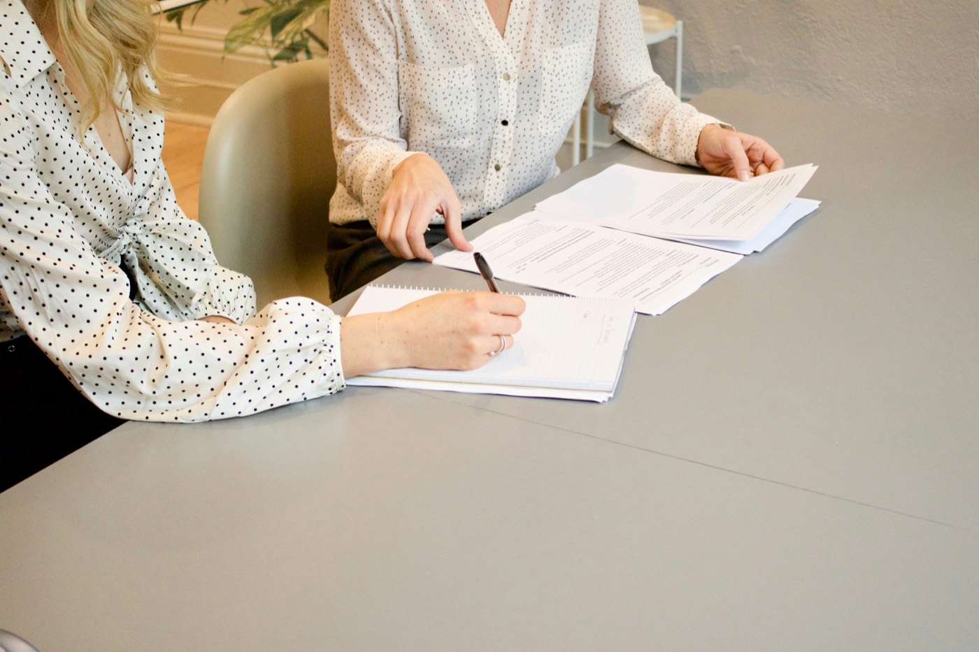New patient registration paperwork and forms on a desk